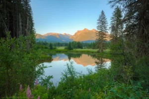 The Cabinet Mountain range reflecting in the Bull River from a turnout along Highway 56.