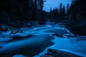 The Yaak River at dusk during the winter. Kootenai National Forest.
