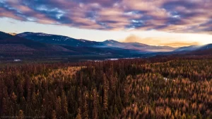 Smoke drifts over an autumn sunset over the Yaak Valley.